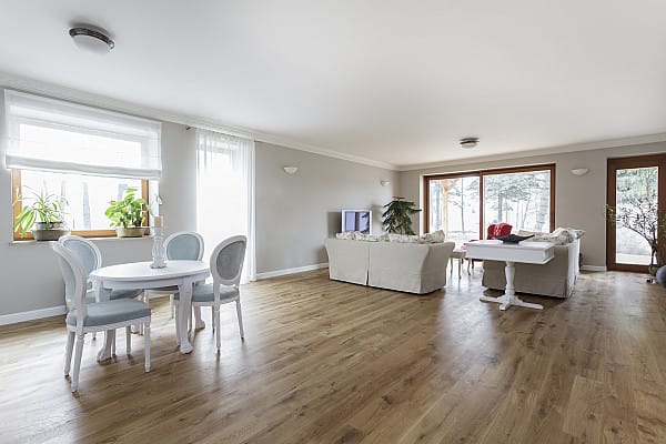 Laminate flooring for an open space home image